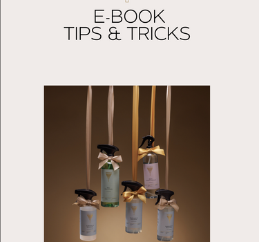 Cover of 'E-Book Tips & Tricks' by Parfumello with perfume bottles on a white background